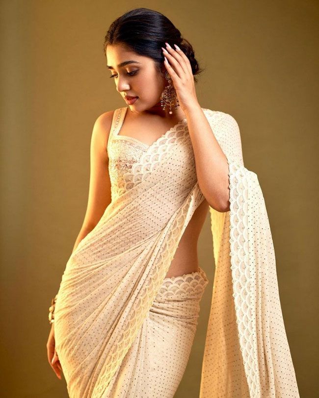 Krithi Shetty Staggering Poses In White Saree